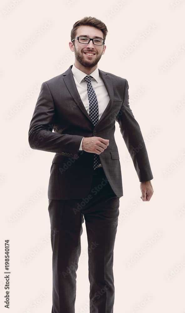 confident businessman goes forward. photo in full growth. confident businessman goes forward. photo in full growth.