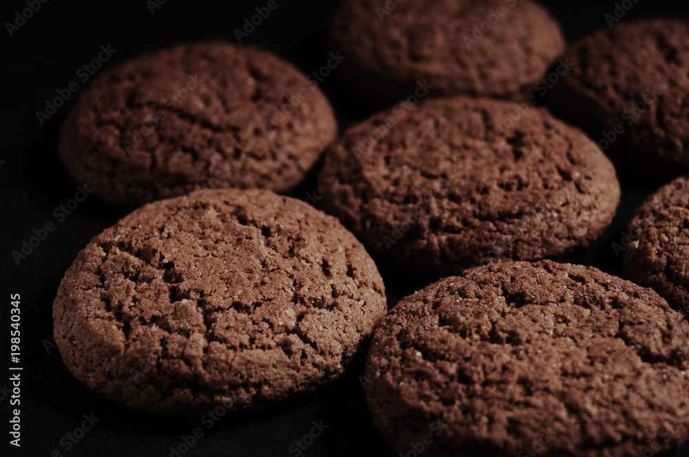 oatmeal cookies on a black table