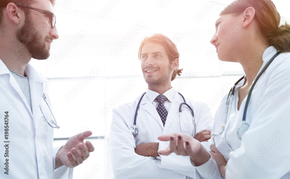 Group of medicine doctors talking during conference, bottom view Group of medicine doctors talking during conference, bottom view