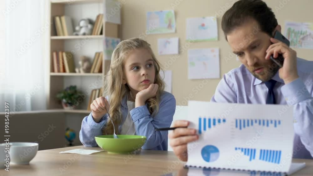 Sad girl feeling lonely while busy father talking on work phone, career priority Sad girl feeling lonely while busy father talking on work phone, career priority
