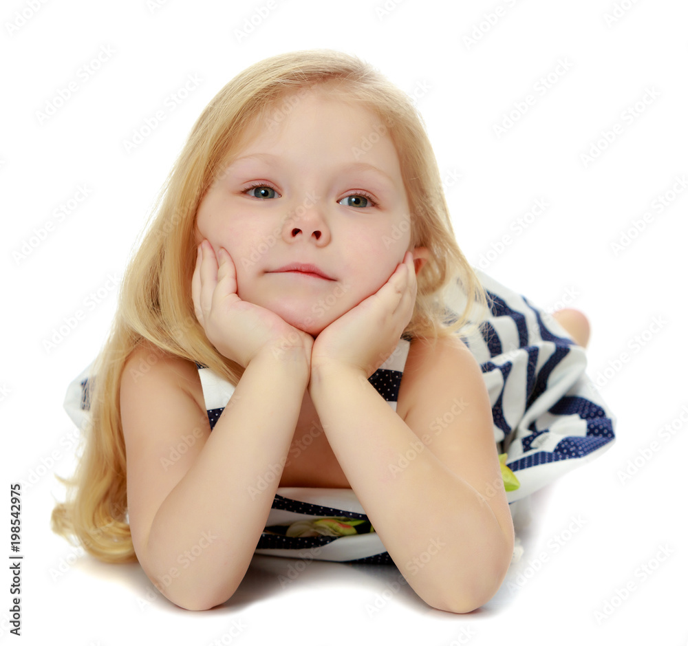 Little girl lies on the floor Little girl lies on the floor