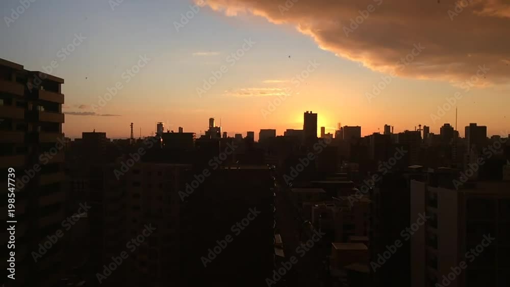 早朝 あられ舞う札幌の町並み 朝日 早朝 あられ舞う札幌の町並み 朝日