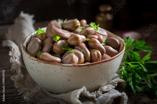 Tasty broad beans with garlic and parsley