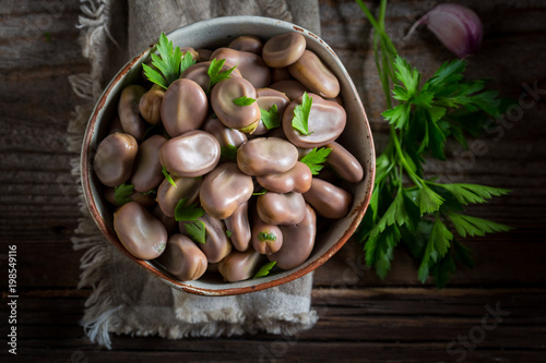 Healthy broad beans in old rustic kitchen photo
