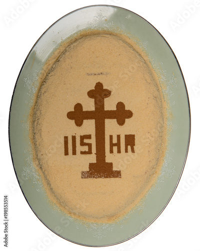 A plate with traditional Coliva, a dish based on boiled wheat that is used liturgically in the Eastern Orthodox Church for commemorations of the dead especially during Easter. photo