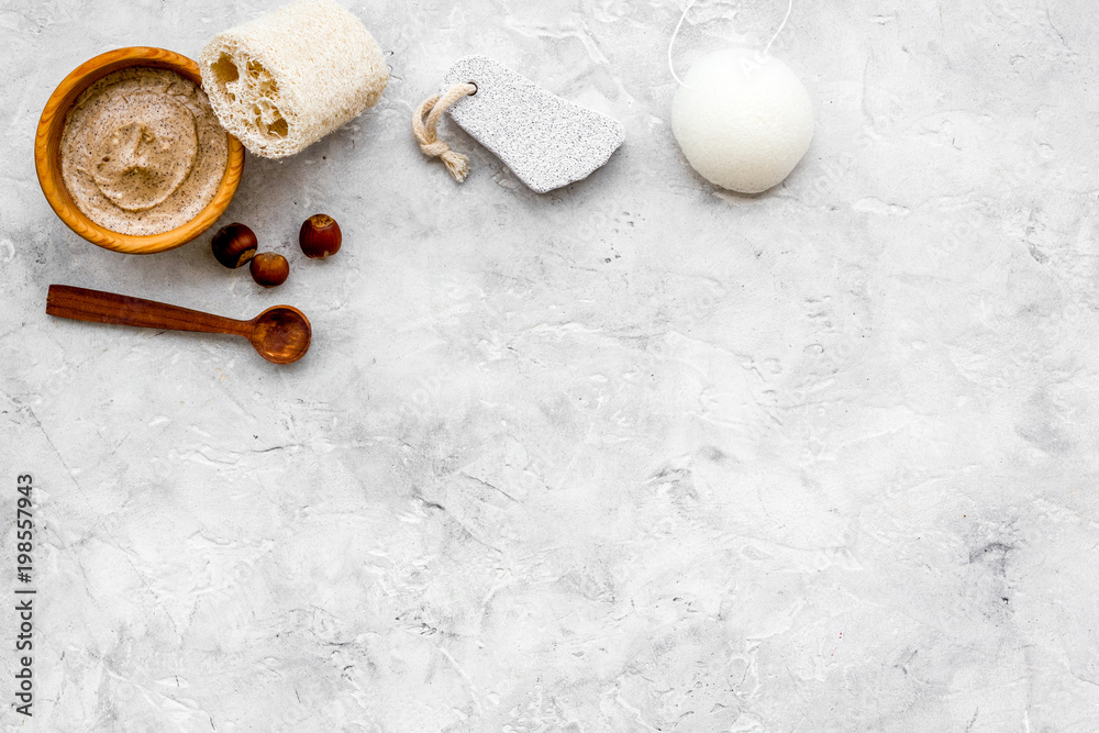 Beauty set with natural hazelnut scrub for spa on stone background top view mockup Beauty set with natural hazelnut scrub for spa on stone background top view mockup