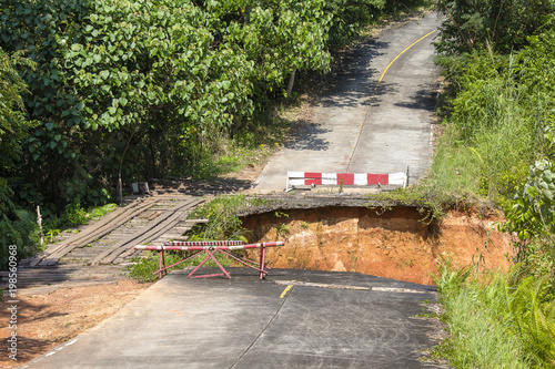 Break of asphalt road in island Koh Chang , Thailand
