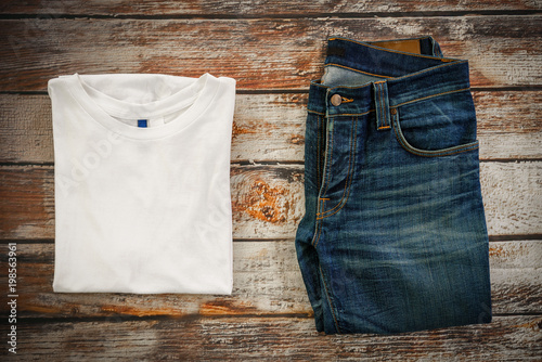 Traveler items vacation travel accessories for holiday or long weekend Simple Denim style Vintage Classic Hipster Look Clothing Overhead  view choice guide idea for planning travel around the world  