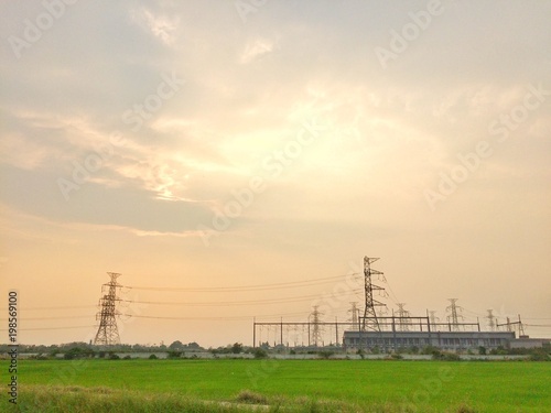 High voltage transmission Electric towers on countryside in Ayutthaya, Thailand