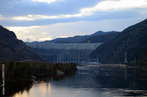 Dam and hydroelectric power station. Wide, powerful, big river Yenisei river. Russia. Siberia