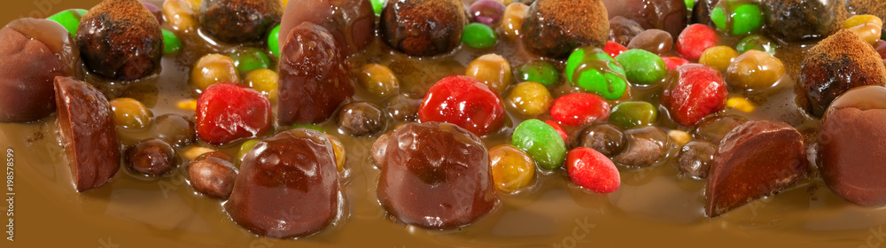 colorful candies in chocolate close-up