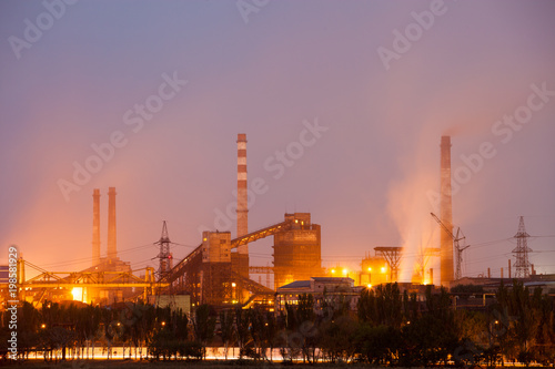 Chemical factory with smoke stack photo