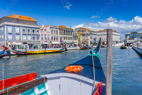 Traditional boats on the canal in Aveiro, Portugal photo