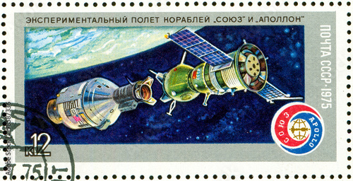 Ukraine - circa 2018: A postage stamp printed in Soviet Union, USSR show Experimental flight of spacecraft Soyuz and Apollo. Docking in space. Series: Space Flight of Soyuz-19 and Apollo. Circa 1975. photo