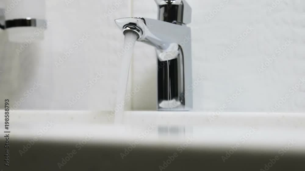 water faucet in a luxurious hotel room or at home in the bathroom. Dolly video water faucet in a luxurious hotel room or at home in the bathroom. Dolly video