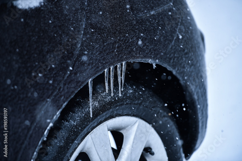 Vehicle covered in ice during freezing rain © roibu