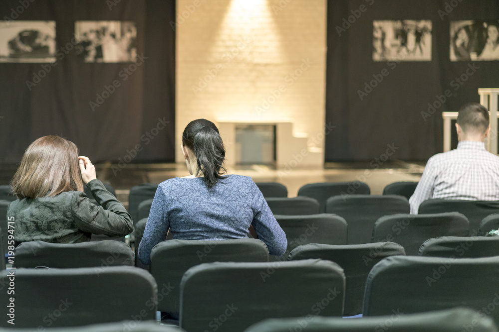 Residents in the theater are waiting for the beginning of the performance. The concept of cultural development.