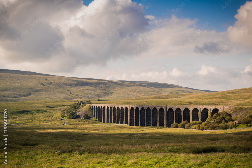 A warm sunset over Ribblehead viaduct, Yorkshire, England