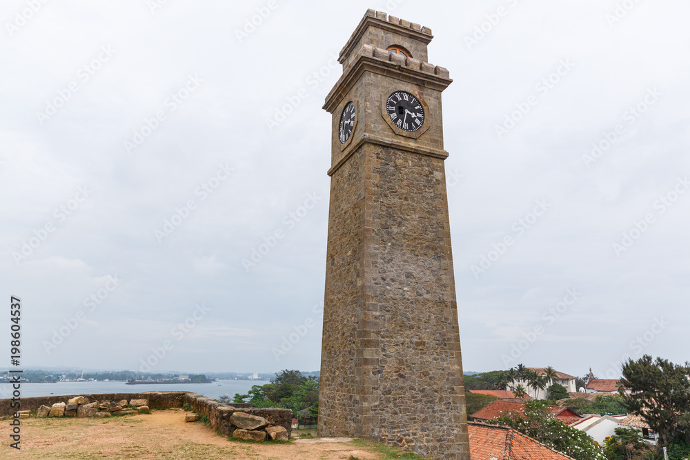 scenic view of city clock against clear blue sky, sri lanka, galle fort