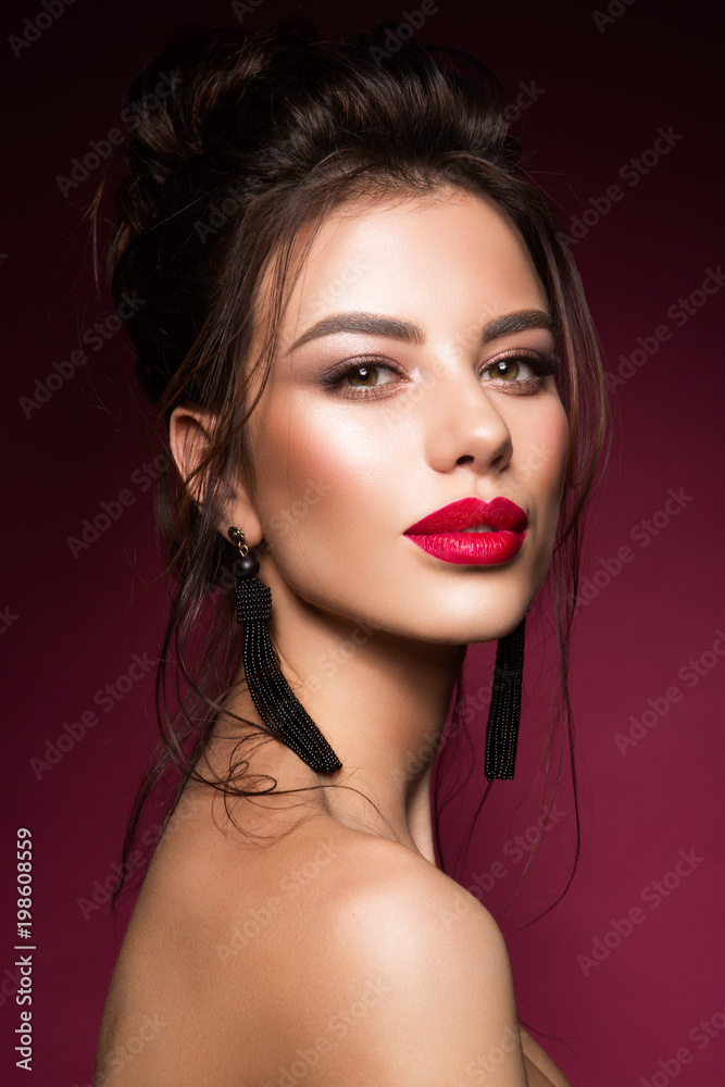 Gorgeous Young Brunette Woman face portrait. Beauty Model Girl with bright  eyebrows, perfect make-up, red lips, touching her face. Sexy lady makeup  for party. Stock Photo | Adobe Stock