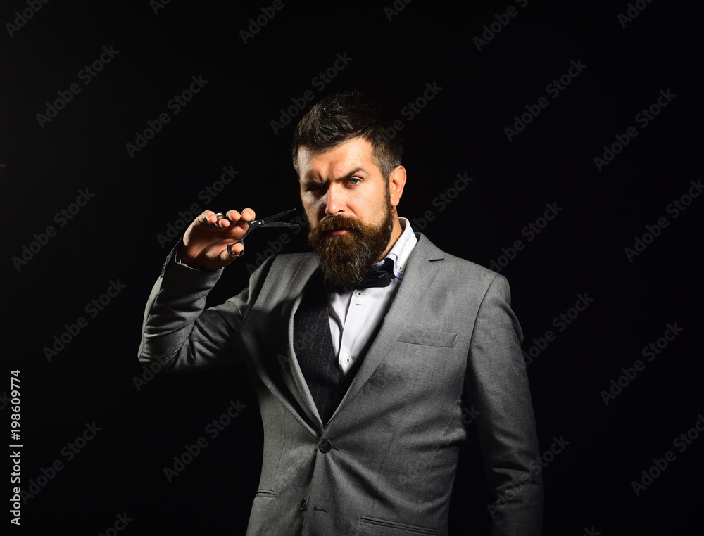 Business and barbershop service concept. Macho in formal suit