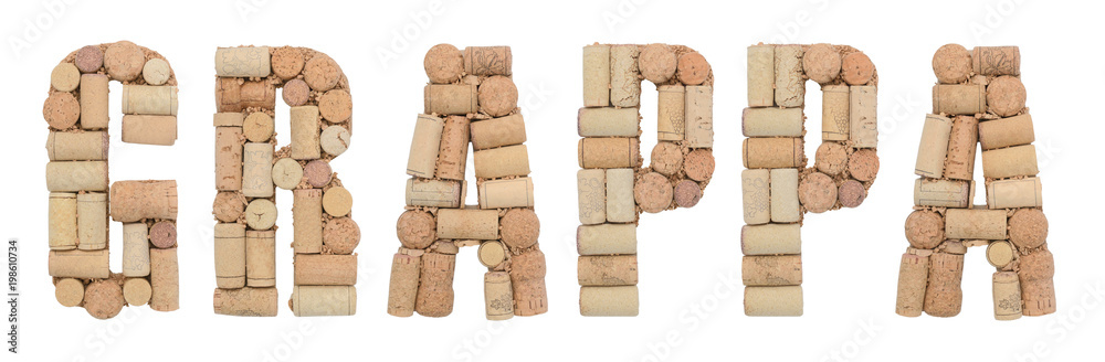 Word Grappa made of wine corks Isolated on white background