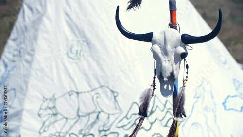 Indian camp with tent and buffalo skull 4K