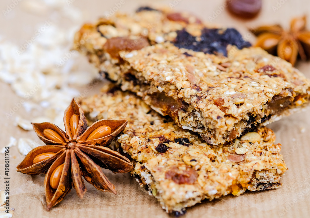 Fototapeta premium Homemade muesli and oatmeal on kraft paper