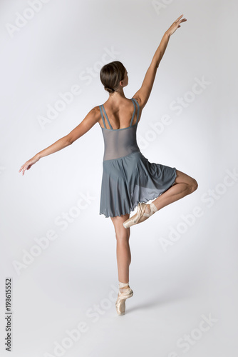 View of the Back of Dancing Ballerina in Gray Leotard