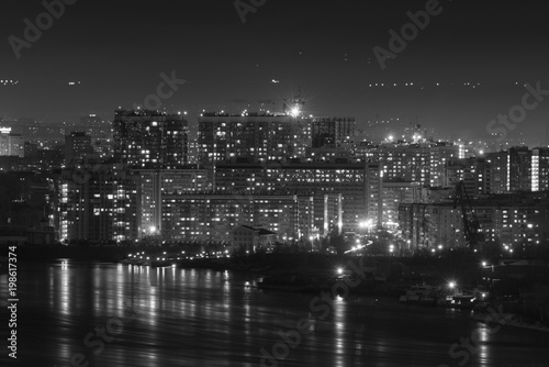 Siberia city Krasnoyarsk on the river Yenisei coast at night