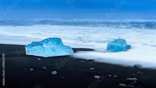Ice on the black beach near Jokulsarlon glacier lagoon, daimond beach, Iceland.