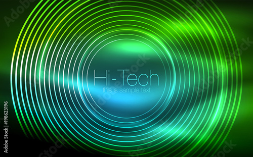 Circular glowing neon shapes, techno background. Abstract shiny transparent circles on dark technology space