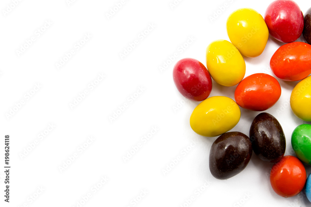 Painted Easter eggs with candy egg on white backgrou isolated Painted Easter eggs with candy egg on white backgrou isolated
