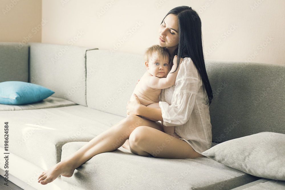 Young mother and child at home