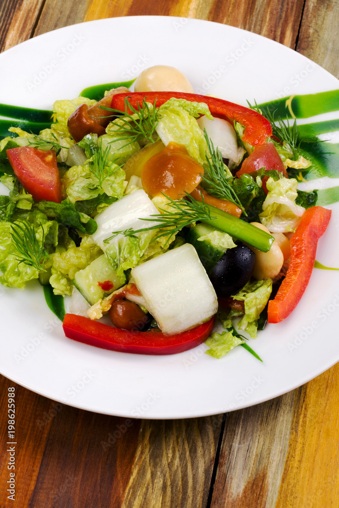 Pickled mushroom salad with raw fresh vegetables. Decorated with dill and slices of red sweet pepper. Vertical. Pickled mushroom salad with raw fresh vegetables. Decorated with dill and slices of red sweet pepper. Vertical.