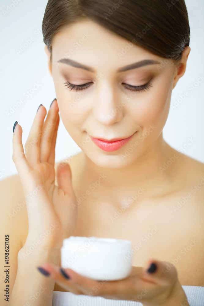Beauty Face Care. Woman Applying Cream On Skin. Beauty Face Care. Woman Applying Cream On Skin.