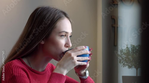 Cute Girl Drinking Coffee. Girl drinking morning coffee