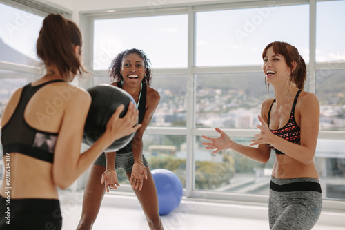Sporty women exercising with medicine ball © Jacob Lund