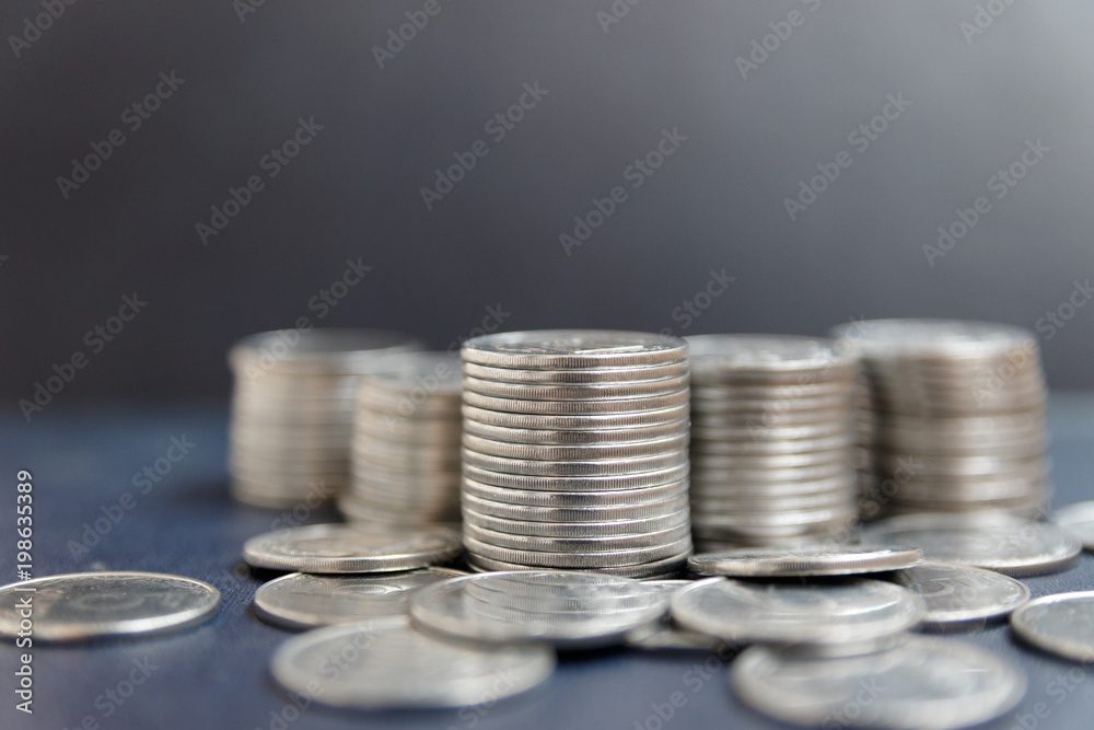 Money, Financial, Business Growth concept, There is money coins to stack of coins. Close up of coins to stack of coins,Saving money for retirement planning. Money, Financial, Business Growth concept, There is money coins to stack of coins. Close up of coins to stack of coins,Saving money for retirement planning.
