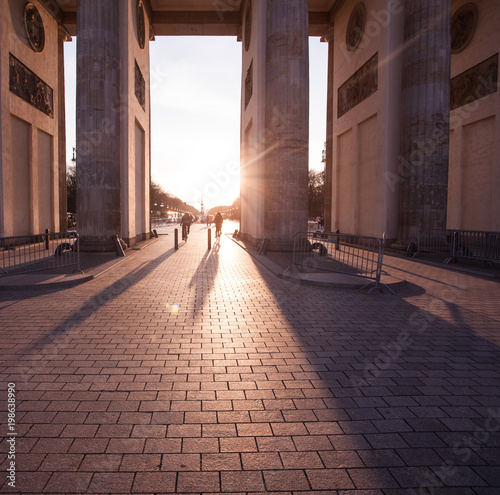 Sunset behind Brandenburg Gate in Berlin