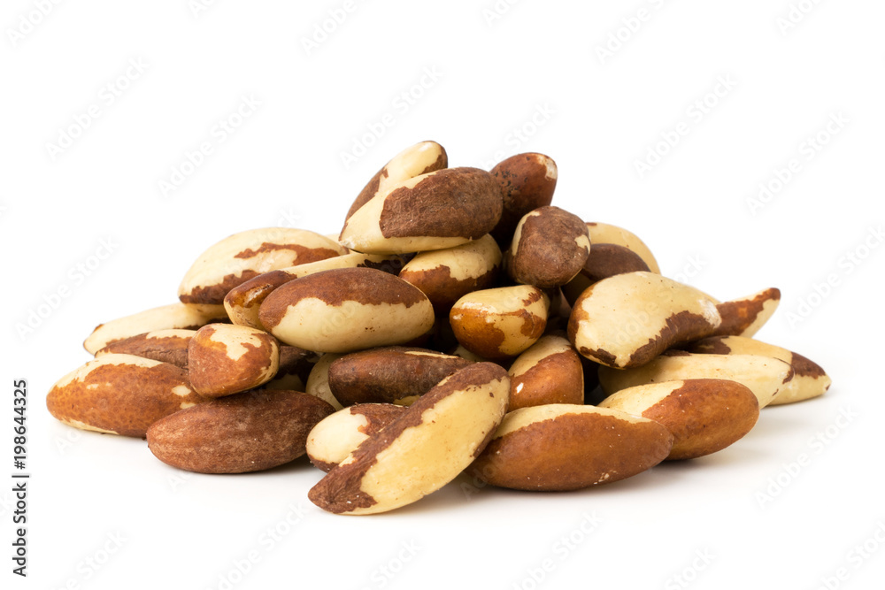 A bunch of Brazilian nuts on a white, isolated. A bunch of Brazilian nuts on a white, isolated.