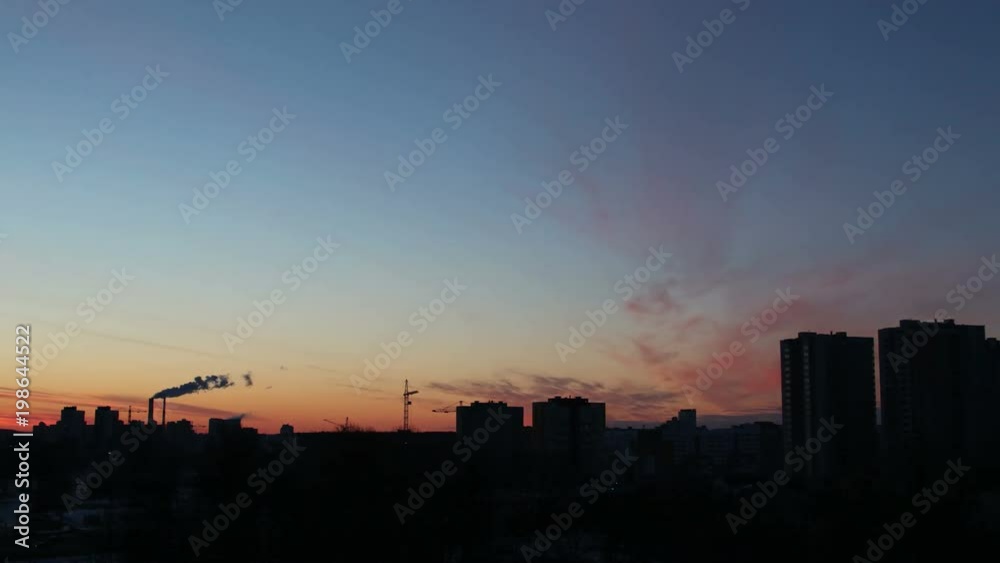Townscape on sunset background, time-lapse 4K.
Townscape on sunset background, time-lapse 4K.