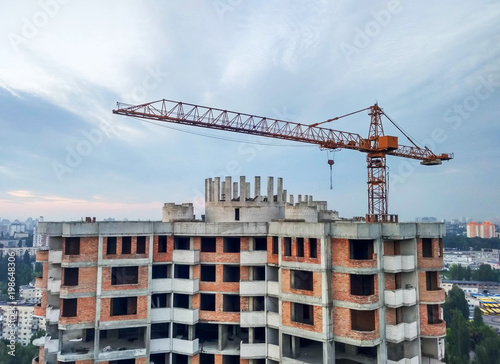crane builds house