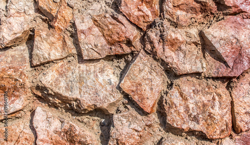 Wall of granite stones