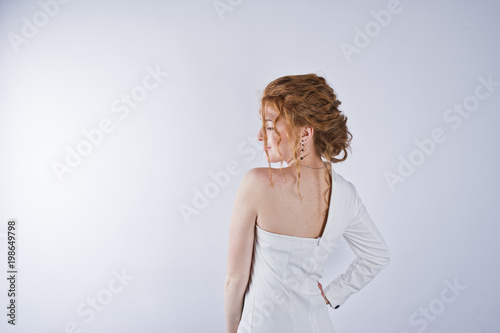 Curly hair girl isolated on white studio background.