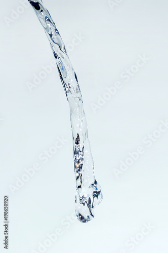 water Splash jet isolate On light blue Background