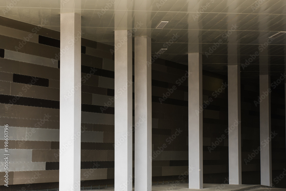 Cement pillars, surround a dark grey background Cement pillars, surround a dark grey background