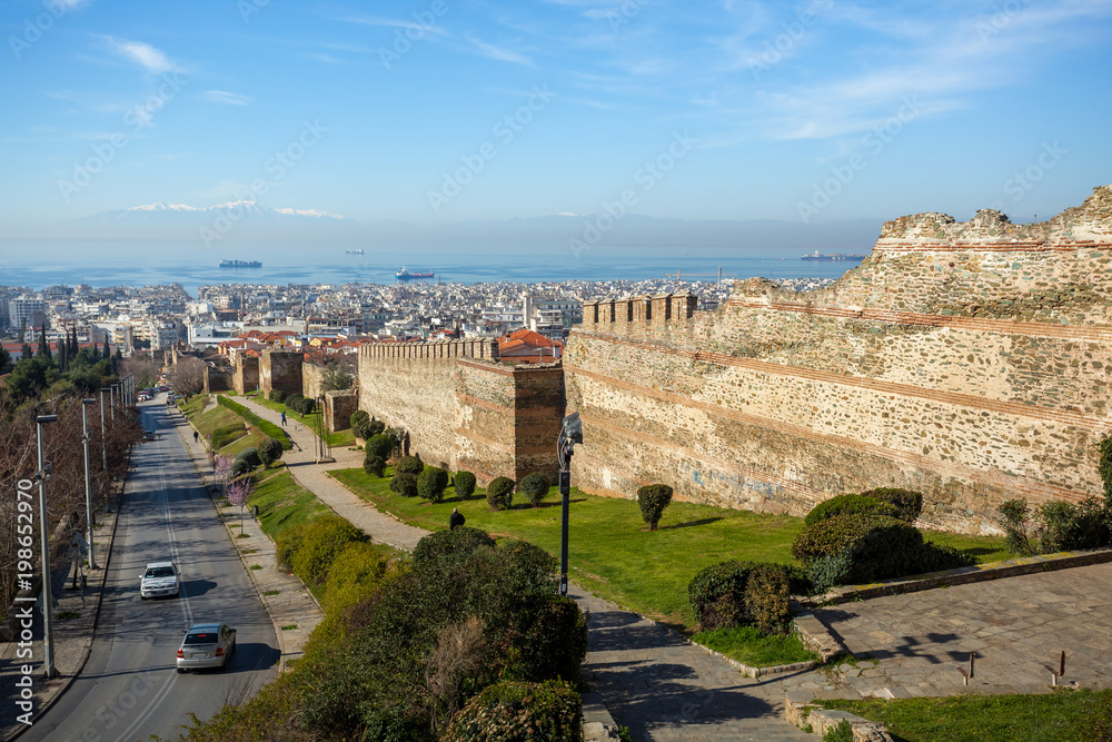 10.03.2018 Thessaloniki, Greece - Panoramic View of Thessaloniki and its Byzantine Wall Ruins, along with Thermaikos Gulf and Mount Olympus in the Background
