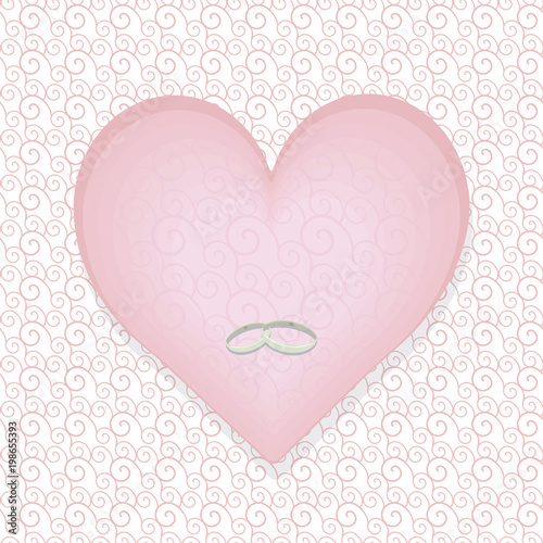 pale pastel pink heart with a pattern with silver thin wedding rings on white patterned background with a shadow postcard