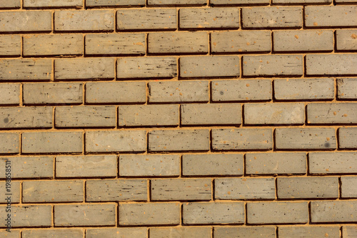 Yellow brick wall. Background and texture
